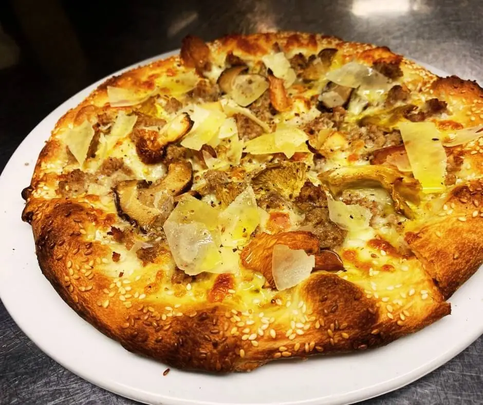 Gourmet mushroom dish with a variety of fresh mushrooms